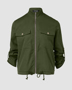 Zip-front jacket with stand collar, chest pockets, drawstring hem, and roll-tab buttoned sleeves.