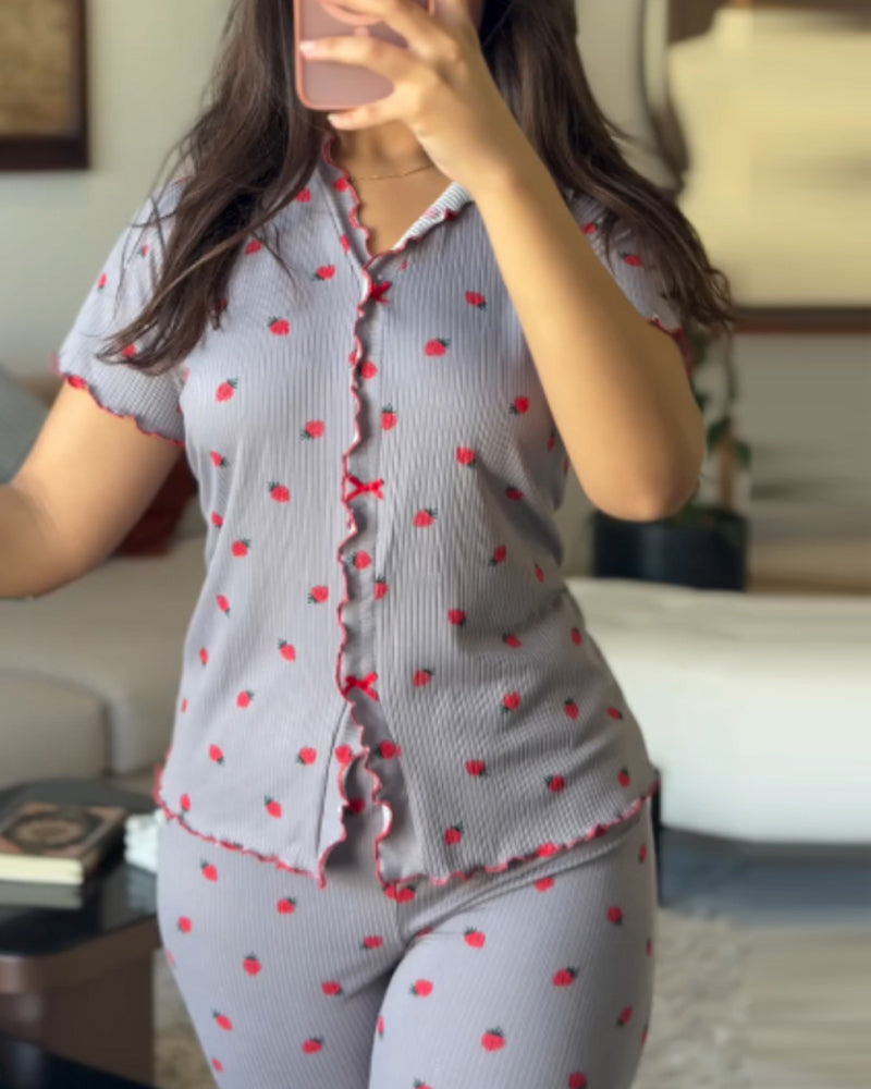 Light purple short-sleeve pajama set with red polka dots and a stand collar tee.