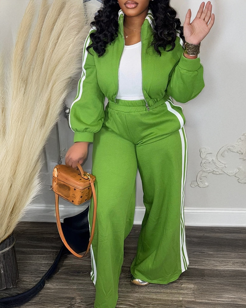 Bright green zip-up crop coat and wide-leg pants set from LA FINE FLEUR.
