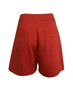 Red linen high-waisted pocketed shorts and matching wrap-style top, shown from the back.