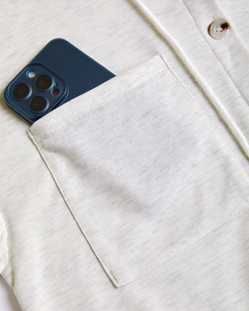 A LA FINE FLEUR  BYPINKYPARIS long sleeve ribbed button-front hoodie with an asymmetrical hem coat.