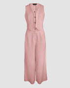 Sleeveless light pink V-neck vest crop top and matching wide-leg pants set.