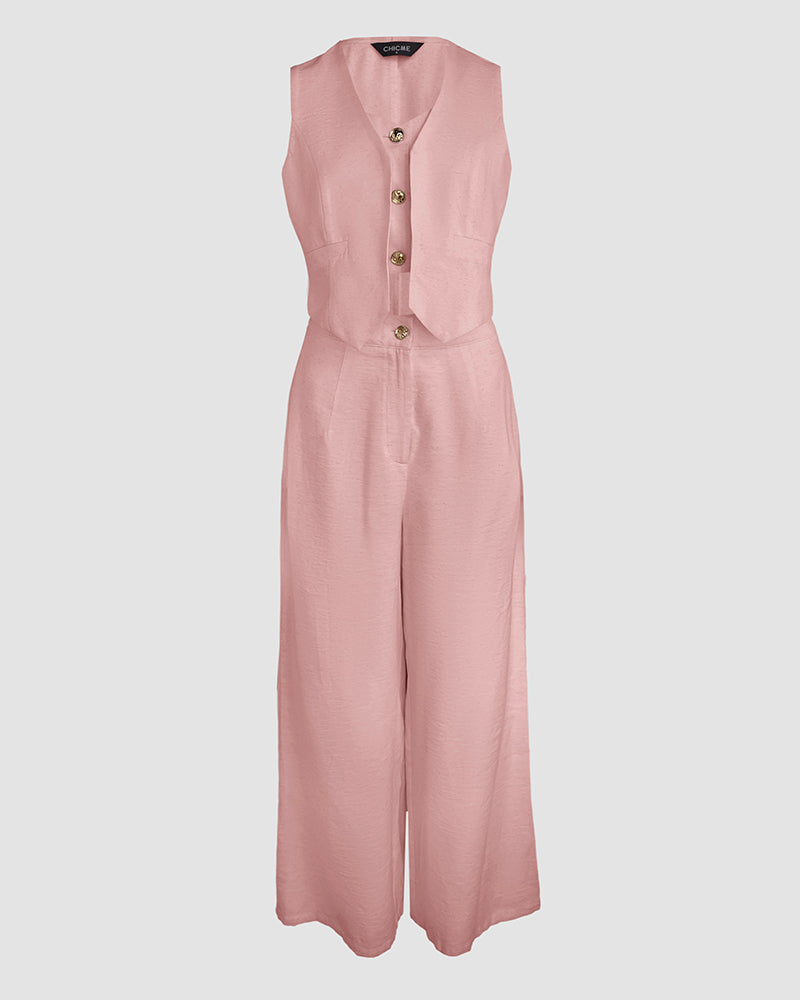 Sleeveless light pink V-neck vest crop top and matching wide-leg pants set.