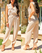 Sleeveless notched collar jumpsuit with drawstring waist and flap pockets, seen front and back.
