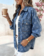 LA FINE FLEUR Vintage Heart Jacquard Denim Jacket with asymmetrical hem, white top, ripped jeans.