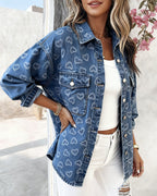 Vintage Heart Jacquard Denim Jacket with asymmetrical hem, white crop top, distressed white jeans.