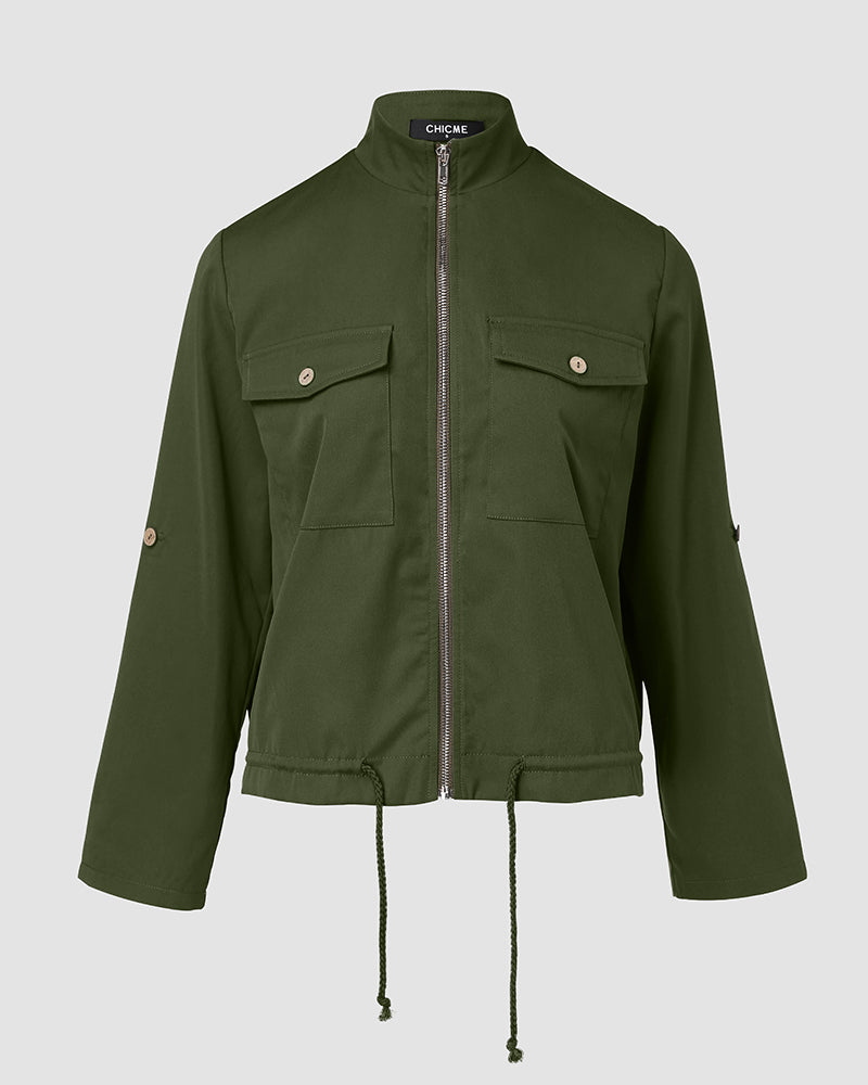 Olive green jacket with stand collar, zip closure, buttoned chest pockets, roll-tab sleeves.