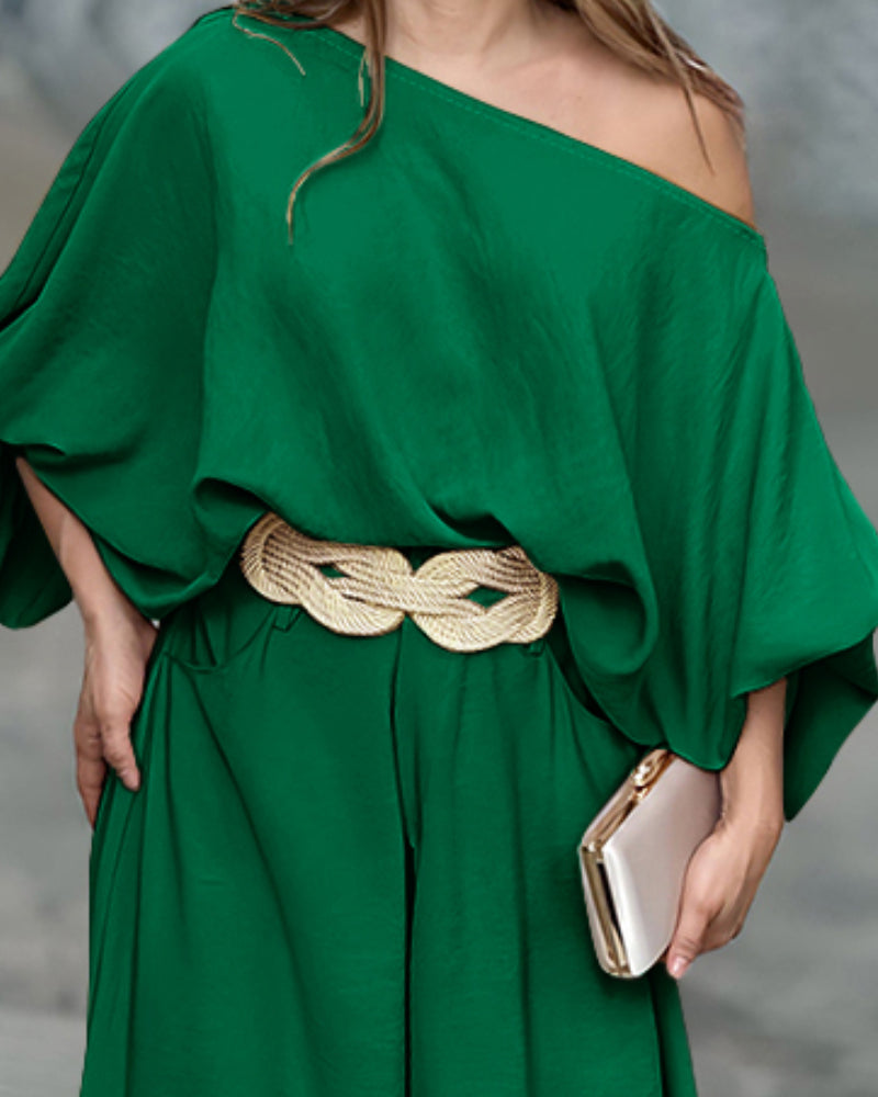 LA FINE FLEUR skew neck lantern sleeve blouse and wide leg pants set in view.