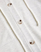 Light grey ribbed long sleeve hoodie coat with cream buttons, drawstring, asymmetrical hem.