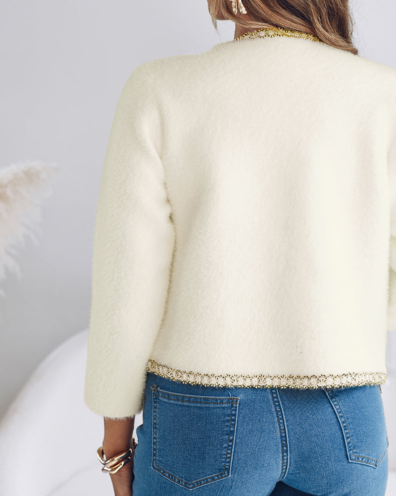 A LA FINE FLEUR  Pearl Button Fluffy Cardigan with elegant contrast trim and blue jeans.