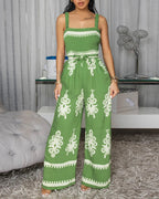 Vintage floral square neck backless wide leg jumpsuit with an elegant, flowy silhouette.