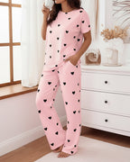 LA FINE FLEUR Valentine's Day heart-patterned top and matching pajama pants set.