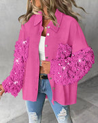 LA FINE FLEUR sequin collar, long sleeve tassel fuzzy shacket over white crop top, ripped jeans.