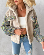 LA FINE FLEUR Turn-Down Collar Teddy Jacket with Sequin Patch, white crop top, distressed blue jeans.