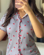 Strawberry print pajama set with stand collar tee, stylish and playful loungewear.