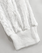 Jacquard diamond pattern lightweight bomber jacket with hollow-out textured white fabric and ribbed cuff.