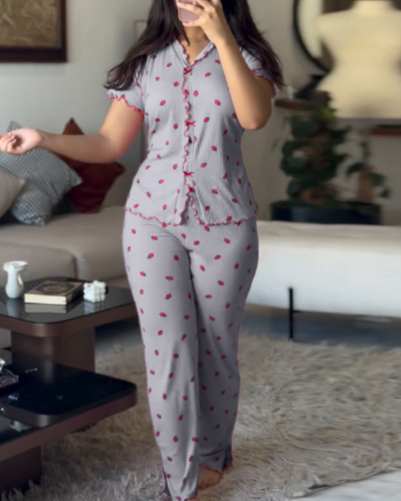 Strawberry Print Pajama Set featuring a stand collar tee and matching pajama bottoms.