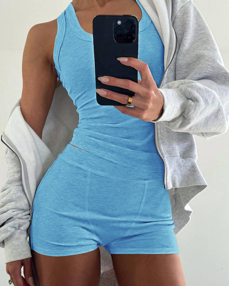 Light blue micro-ribbed U-neck tank and boxer lounge set with a gray zip-up sweatshirt.
