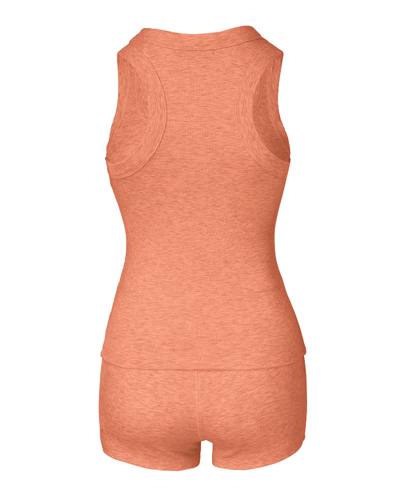 Sleeveless, peach micro-ribbed tank and matching boxer shorts with U-neck design.