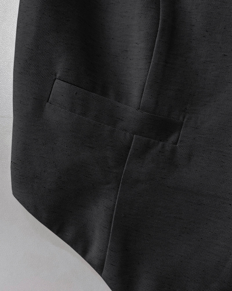 V-neck vest crop top with wide-leg pants, featuring detailed pocket stitching and textured fabric.