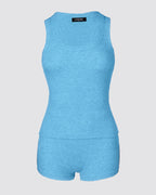 A sleeveless blue micro-ribbed U-neck tank top with matching boxer-style lounge shorts.