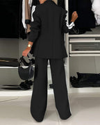 LA FINE FLEUR's 2-piece notched collar blazer with matching wide-leg pants ensemble.