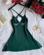 Deep green V-neck lace babydoll with criss-cross side slit, delicate and elegant.