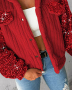 Red LA FINE FLEUR teddy jacket with sequin patch, white crop top, blue ripped jeans.