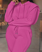 Bright pink LA FINE FLEUR 2-piece long sleeve hoodie and wide-leg pants set with thumbholes.