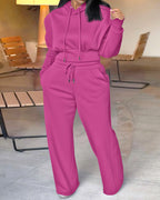 Bright pink 2-piece hoodie and wide-leg pants set with thumbholes, drawstring waist, pockets.