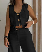 Black V-neck vest crop top and wide-leg pants set from LA FINE FLEUR.