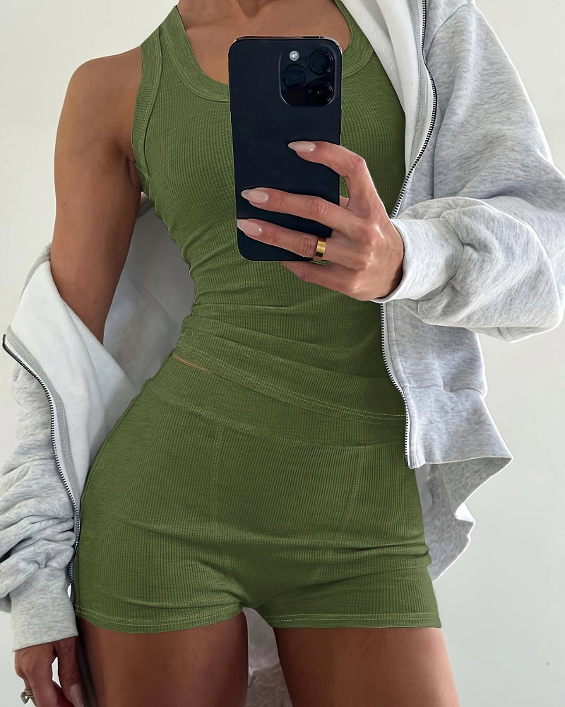 Olive green micro-ribbed tank and boxer set, layered with a light gray zip-up hoodie.