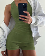Olive green micro-ribbed tank and boxer set, layered with a light gray zip-up hoodie.