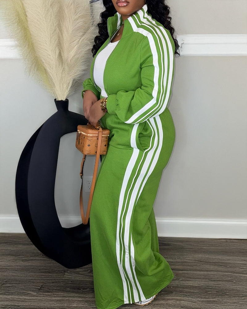 Green zip-up crop coat and wide-leg pants set with white stripes.