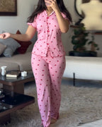 LA FINE FLEUR strawberry print pajama set with a stand collar tee and matching pants.