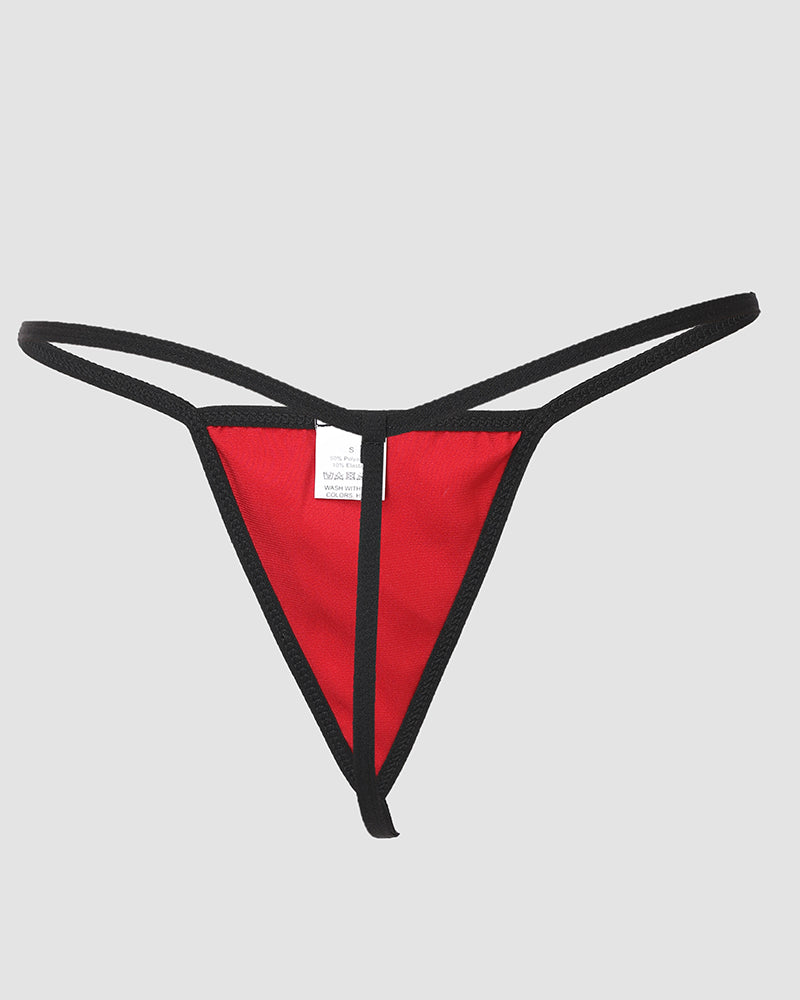 A red triangular thong with black straps and a white tag on the waistband.