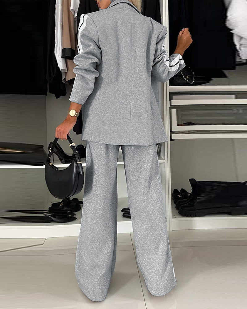 A notched collar blazer and wide-leg pants set with white stripes, loose fit.