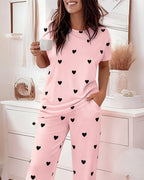 A Valentine's Day heart patterned top and pajama pants set by LA FINE FLEUR.