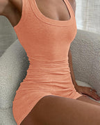 An orange micro-ribbed U-neck tank and matching boxer lounge set from LA FINE FLEUR.