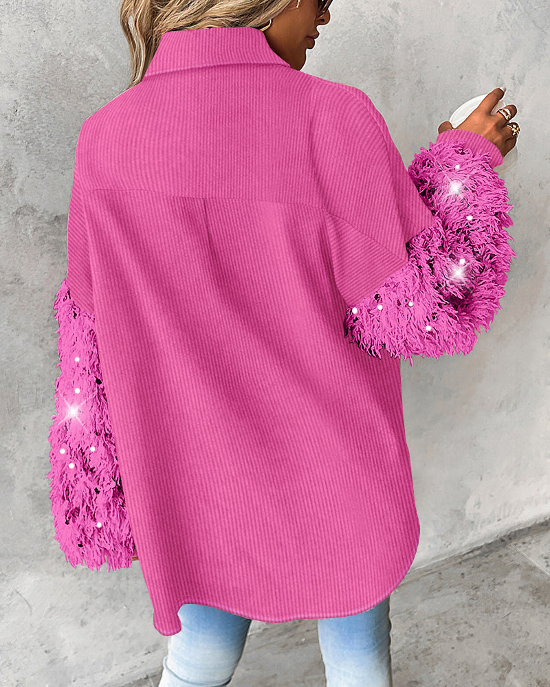 LA FINE FLEUR Contrast Sequin Collar Long Sleeve Tassel Fuzzy Shacket with Pocket and light blue jeans.