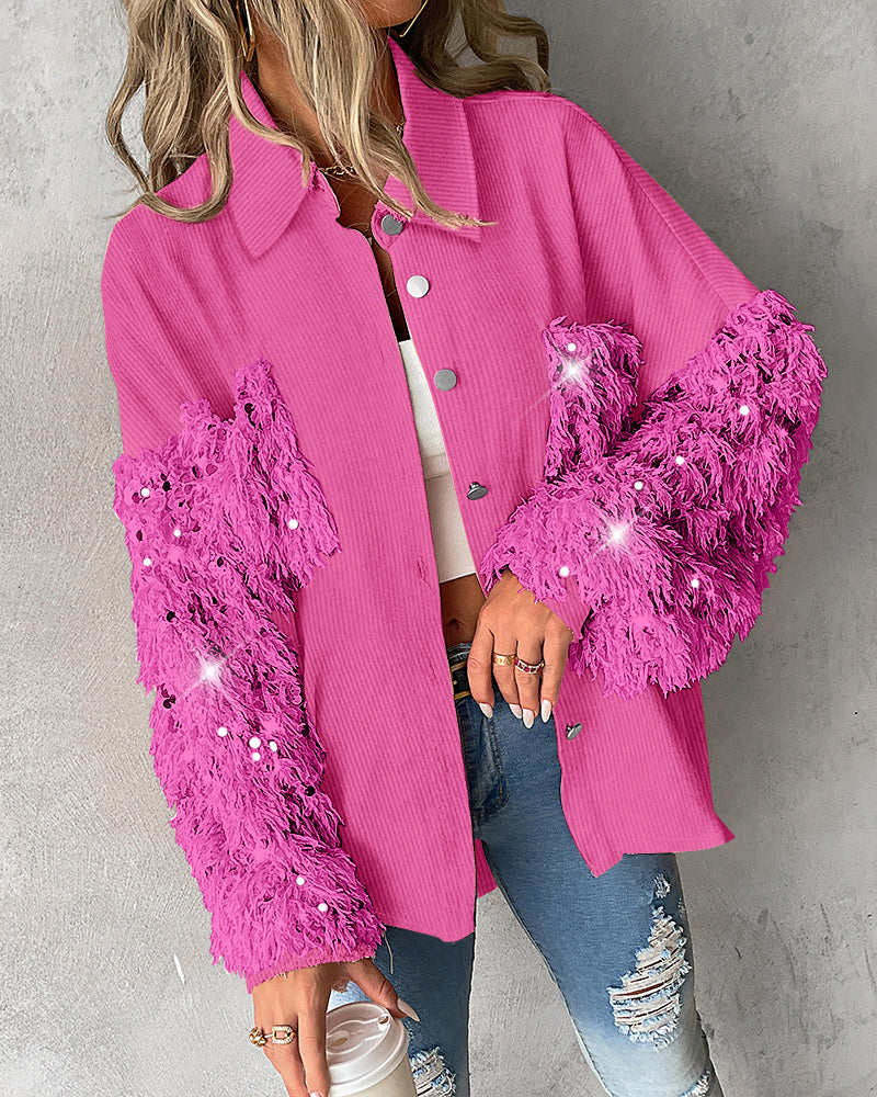LA FINE FLEUR sequin collar shacket with tassels, white crop top, ripped blue jeans.