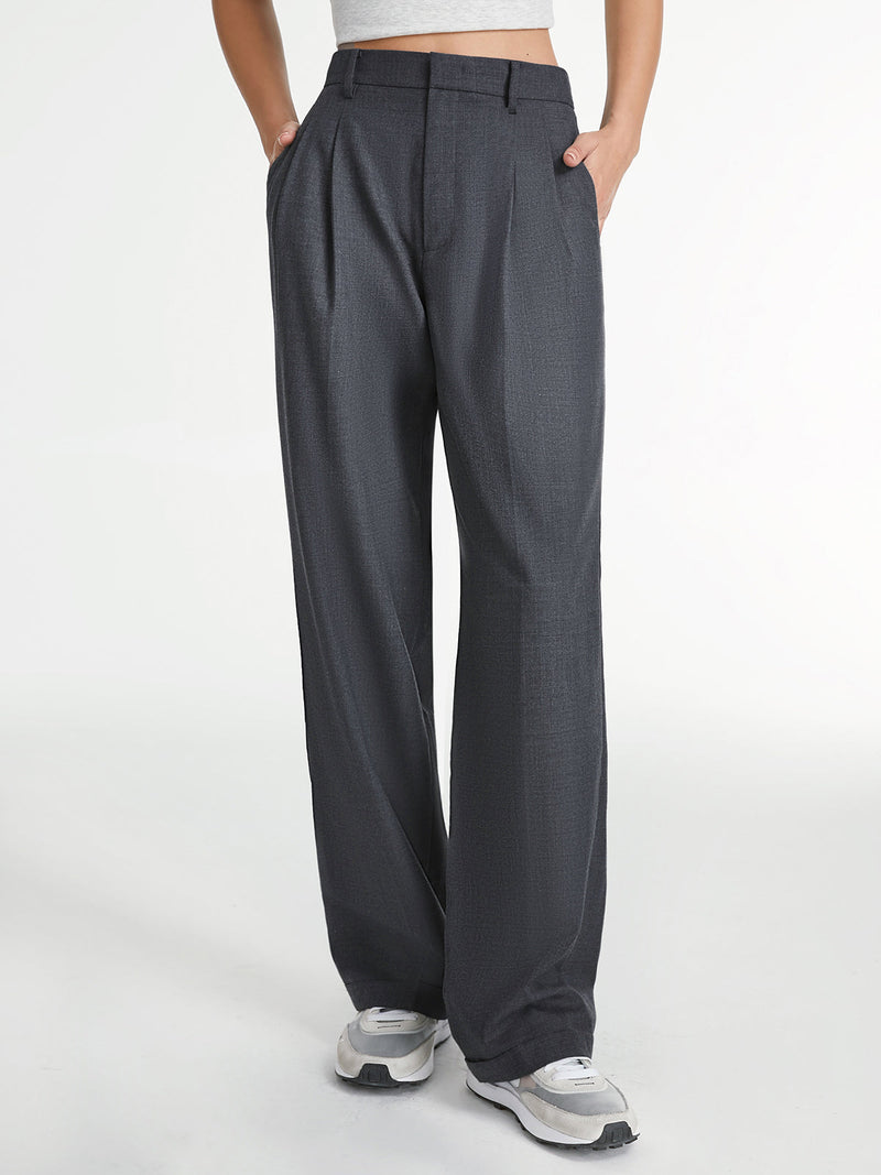 Charcoal gray LA FINE FLEUR Airstream tailored straight-leg dress pants with white sneakers.