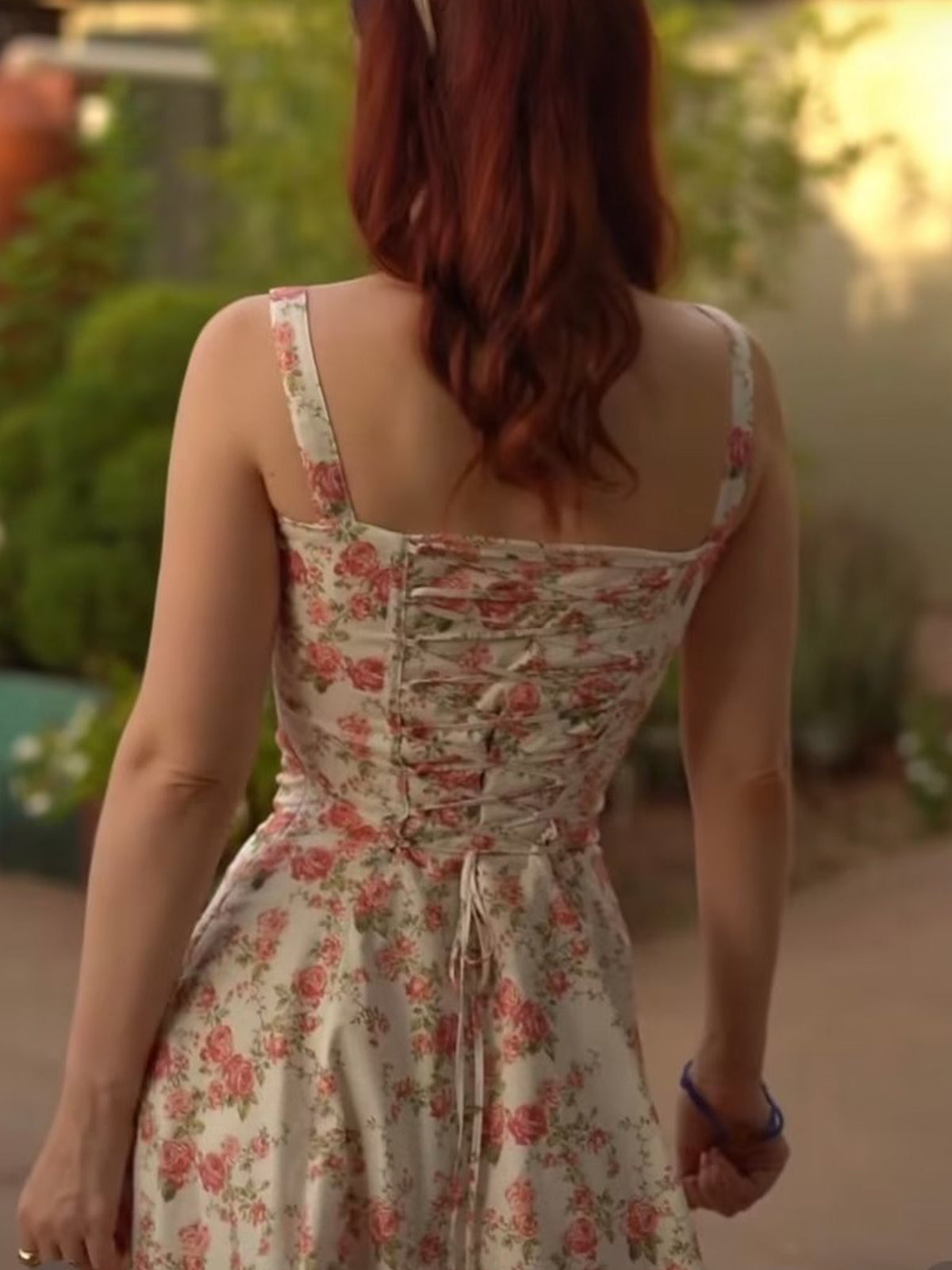 Sleeveless LA FINE FLEUR Rosebud Print Midi Dress with lace-up back and floral pattern.