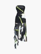 Strapless black midi dress with white floral print, green stems, ruched bodice, asymmetric hem.