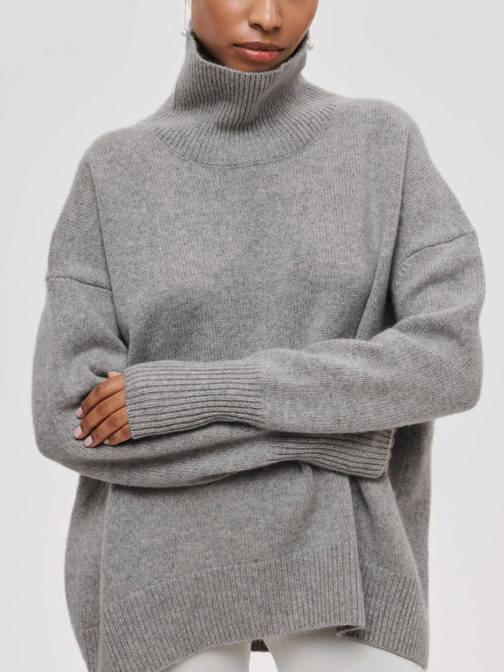 Light gray BYPINKYPARIS Clear Sky Turtleneck Oversized Sweater with long sleeves.
