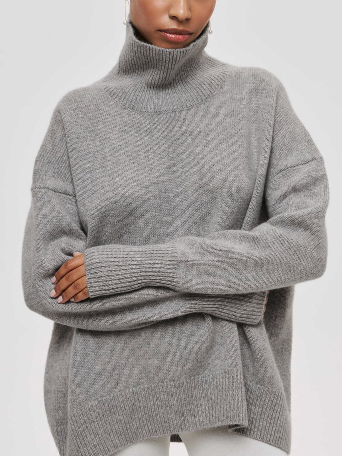 Light gray BYPINKYPARIS Clear Sky Turtleneck Oversized Sweater with long sleeves.