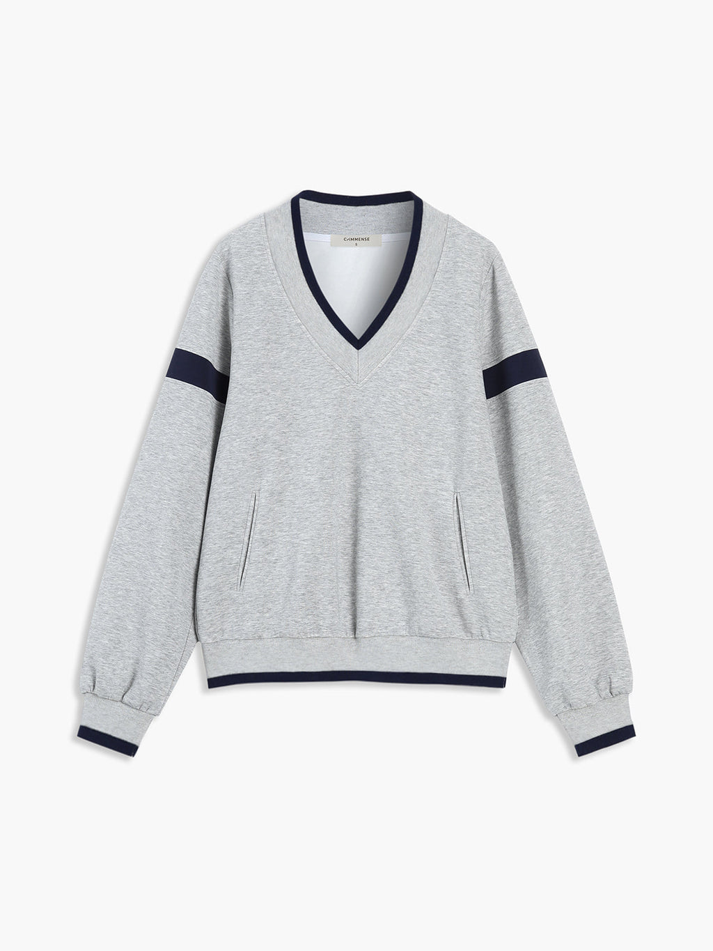 Light gray V-neck sweatshirt with navy striped sleeves, contrast trim, pockets, and relaxed fit.