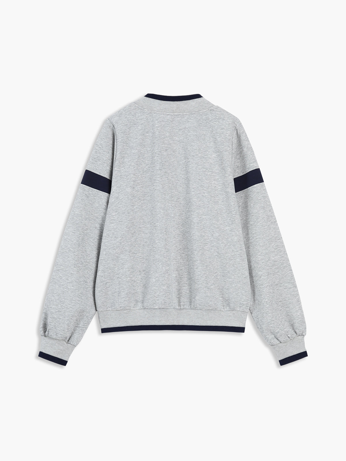 Light grey oversized sweatshirt with navy sleeve stripes and ribbed navy-trimmed cuffs, collar, waistband.