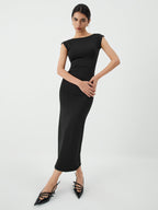 A sleek open-back midi dress in a sophisticated style, perfect for evening events.