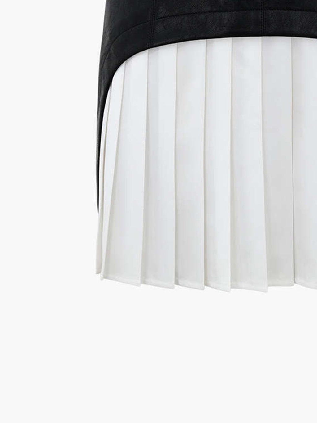 A faux leather mini skirt with black quilted waistband and white pleated front panel.